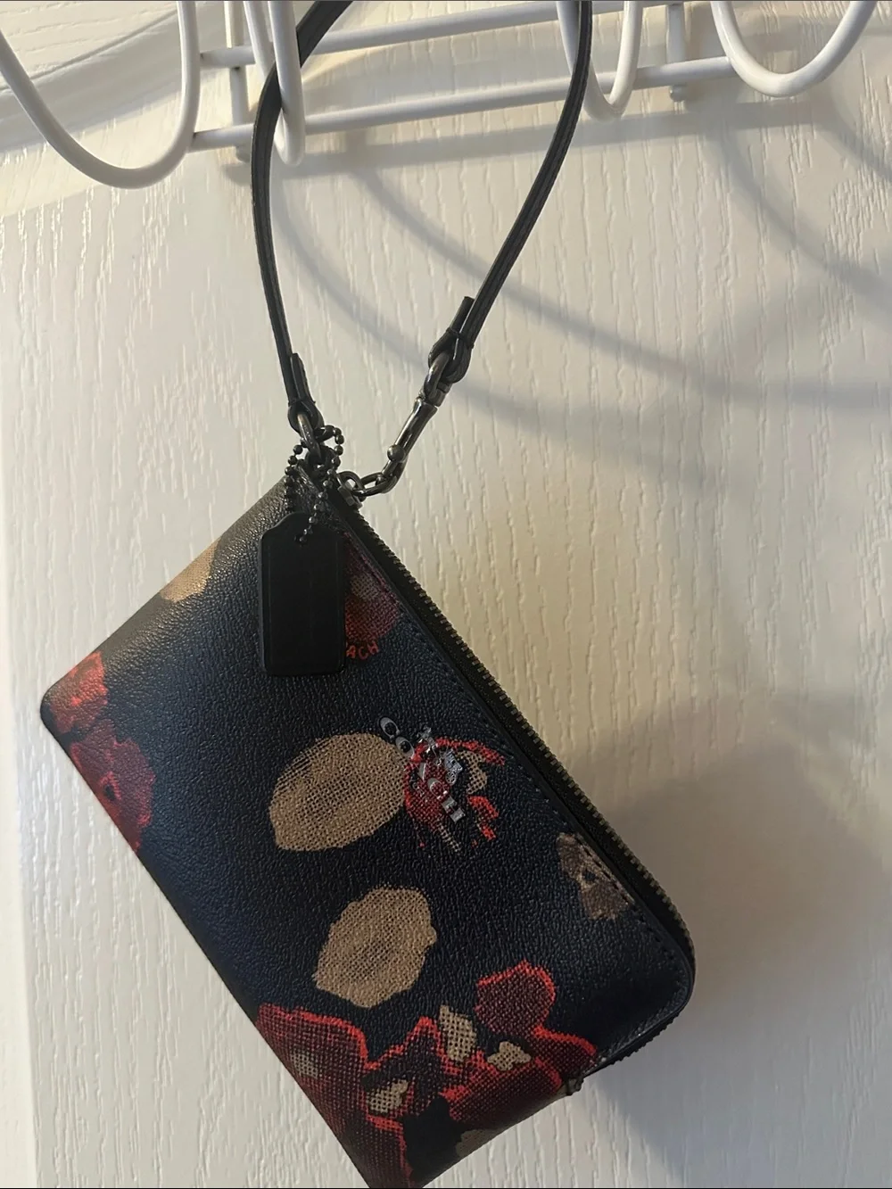 Coach Black Floral Zip Wristlet with Floral Red and Tan Accents